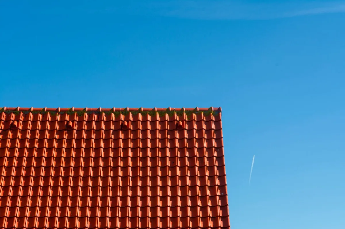 Tile roof gable in full sun, the kind of exposure that sets roof life in Madison, AL